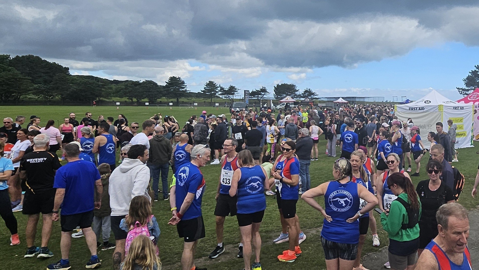 Runners warning up at Denes Oval for the Lowestoft 10K